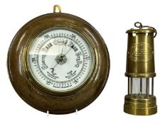 CIRCULAR OAK-CASED ANEROID BAROMETER, 27.5cms (diam.), and a British Coal Mining Company of Wales