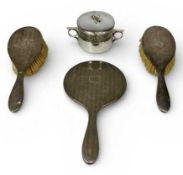 SILVER-BACKED HAND MIRROR & TWO MATCHING HAIRBRUSHES, engine turned decoration, monogrammed 'M',
