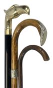 EBONISED WALKING STICK with heavy cast brass eagle's head handle, walking stick with embossed