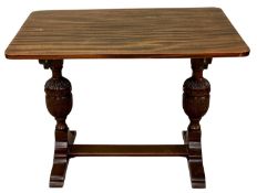 AN EDWARDIAN REFECTORY STYLE TEA TABLE, on pineapple type supports, 75 (h) x 104 (w) x 75cms (d)