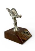 ROLLS-ROYCE PRESENTATION SILVER-PLATED 'THE FLYING LADY', mounted on a polished wooden plinth with