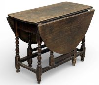 CIRCA 1900 ANTIQUE OAK GATELEG TABLE, on turned and block supports, 69 (h) x 49/130 (w) x 101cms (d)