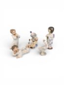 FIVE VARIOUS LLADRÓ FIGURINES, including children, clown, angels, and duck, largest 19cms (h)
