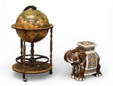 DRINK'S GLOBE TROLLEY, 88 (h) x 51cms (diam.); and a porcelain elephant garden seat, 43 (h) x 53 (w)