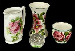 WEMYSS WARE VASE of cylindrical waisted form, painted with pink flowers and leaves, 16cms (h); a