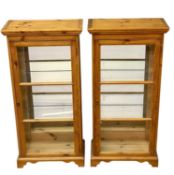 PAIR OF MODERN PINE CABINETS mirrored, with glass doors and interior shelving, 121 (h) x 61 (w) x