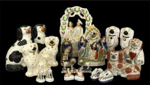 ASSORTMENT OF STAFFORDSHIRE FIGURES, 19th century and later, including pair of black and cream