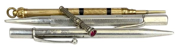 TWO SILVER PROPELLING PENCILS, a yellow metal propelling pencil with enamelled bands, and a white
