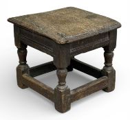 EARLY 19TH CENTURY OAK MILKING TYPE STOOL, on turned and block supports and stretchers, 29 (h) x