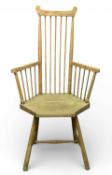 LIBERTY & CO. 'QUAINT FURNITURE RANGE' STICK-BACK ELBOW CHAIR, with a hexagonal seat, 110 (h) x