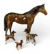 BESWICK HORSES, large bay hunter and three foals Provenance: deceased estate Conwy