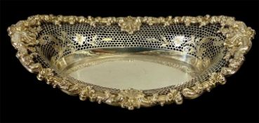 THEODORE B. STARK AMERICAN SILVER OVAL DISH, foliate and shell embossed border, pierced honeycomb
