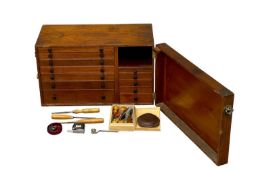 MAHOGANY COLLECTOR'S CABINET, single door enclosing twelve various baize-lined drawers, 33 (h) x