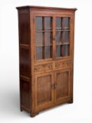 EARLY 19TH CENTURY OAK WELSH CWPWRDD GWYDR / PROVISIONS CUPBOARD with upper glazed doors, central