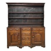 18TH CENTURY OAK NORTH WALES WELSH DRESSER with breakfront, three-shelf rack, T arrangement of