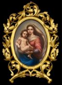 KPM OVAL PORCELAIN PLAQUE, 19th century, depicting the Sistine Madonna with Child, in ornate
