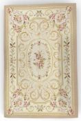 AUBUSSON NEEDLEPOINT RUG, cream ground with scrolls and pink roses, 190 x 123cms Provenance: