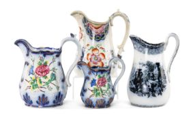 FOUR YNYSMEUDWY POTTERY JUGS, comprising two floral moulded, a Gaudy Welsh, and a black printed jug,