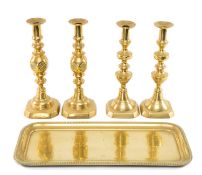 TWO PAIRS OF ANTIQUE BRASS CANDLESTICKS, one pair stamped 'Good Luck', 32cms (h); and a brass