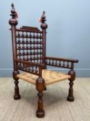 PAKISTANI TEAK PUNJABI CHAIR, label for M. Hayat & Bros, Peshawar, spindle back and arms, cord