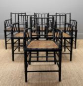 SET OF EIGHT REGENCY STYLE EBONISED FAUX BAMBOO ARMCHAIRS, with caned seats, 81 (h) x 52cms (w) (