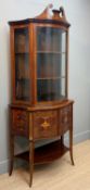 EDWARDIAN SHERATON REVIVAL MARQUETRY BOWFRONT CHINA CABINET, broken arch pediment, glazed upper
