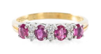 RUBY & DIAMOND CLUSTER RING in 18ct gold, set with four oval-cut rubies dispersed with six small