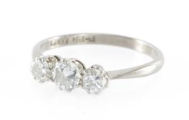DIAMOND THREE-STONE RING, the central round-cut diamond approx. 0.3cts, flanked by two smaller