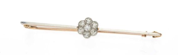 YELLOW & WHITE METAL SEVEN-STONE DIAMOND FLOWERHEAD BAR BROOCH, 6cms length, 3.7g Provenance: