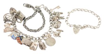 SILVER CURB-LINK CHARM BRACELET with padlock clasp, supporting twenty charms, gross weight 66g; a