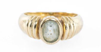 AQUAMARINE SOLITAIRE RING in 9ct gold, oval-cut stone in a rub-over mount, size K, 3.48g Provenance: