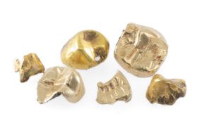 SMALL AMOUNT OF DENTAL GOLD with cement remnants, approx. 7.3g Provenance: deceased estate Wirral