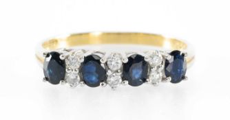 SAPPHIRE & DIAMOND CLUSTER RING in 18ct gold, set with four oval-cut sapphires dispersed with six