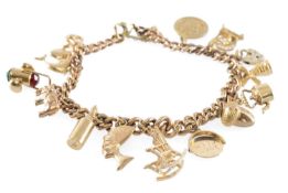 9CT GOLD CURB-LINK CHARM BRACELET, supporting fourteen 9ct gold charms, with safety chain, gross