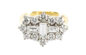 DIAMOND CLUSTER RING, centred with three baguette diamonds totalling approx. 1.18cts, bordered