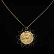 SOVEREIGN PENDANT NECKLACE, George V sovereign, 1912, within a 9ct gold star-form pendant mount,