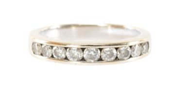 18CT GOLD DIAMOND HALF-HOOP ETERNITY RING, channel set with 9 round brilliant-cut diamonds, total