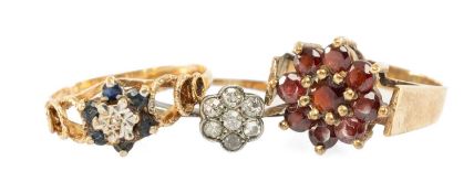 THREE GOLD RINGS comprising 18ct gold seven-stone diamond ring (2.0g), 9ct gold garnet cluster