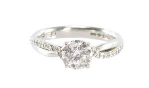 DIAMOND SOLITAIRE RING, the round brilliant-cut stone estimated as I/J in colour and I/Piqué