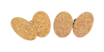 PAIR OF 9CT GOLD OVAL CUFFLINKS, foliate engraved, 4.1g gross in T A Henn of Wolverhampton box (2)