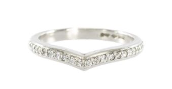 DIAMOND HALF-ETERNITY RING set in platinum, conforming to the previous lot, channel set with tiny
