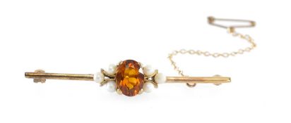 FIRE OPAL & PEARL BAR BROOCH in 9ct gold, the central oval-cut stone approx. 9 x 6mms, flanked on
