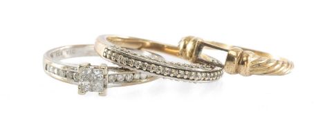 PRINCESS DIAMOND CLUSTER RING in 9ct white gold, centred with a cluster of four diamonds, the