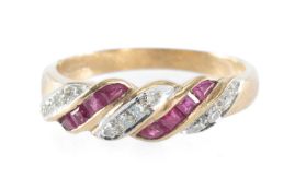 RUBY & DIAMOND CLUSTER RING, set with two rows of small square-cut rubies, dispersed with