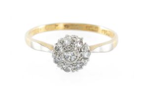 DIAMOND CLUSTER RING, set with eight small brilliant-cut stones, illusion set in platinum on an 18ct