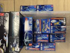 STAR TREK SPACESHIP MODEL KITS by AMT Model Kits, all boxed, four sealed (13) Provenance: deceased