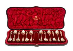 SET OF TWELVE EDWARDIAN SILVER TEASPOONS & SUGAR TONGS, with bright-cut decoration, Ackroyd