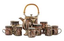 BRIGLIN POTTERY, selection of tableware including teapot, mugs, and a lidded goblet Provenance: