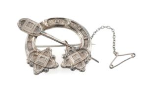 EDWARD VII SILVER IRISH PENANNULAR BROOCH, of archaeological design, with safety chain Provenance:
