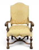 WALNUT-FRAMED ARMCHAIR, early 18th century in style, outswept arms with scroll terminals, gold and